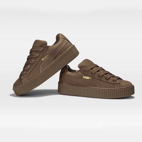 Fenty x @puma just dropped the upcoming slate of Creeper Phatty colorways, fronted by @badgalriri herself. First up, we have the “Totally Taupe” iteration, a sleek and stylish sneaker that’s sure to turn heads.Crafted with a luxurious nubuck build and drenched in an all-brown hue, this kick is the epitome of sophistication.But the Creeper Phatty party doesn’t stop there! Joining the “Totally Taupe” are the equally stunning “Green Fog” and “Warm White” colorways. These beauties are constructe... Puma Boots, Fenty X Puma, The Creeper, Fenty Puma, Stylish Sneakers, Creepers, Beautiful One, Warm White, Sleek