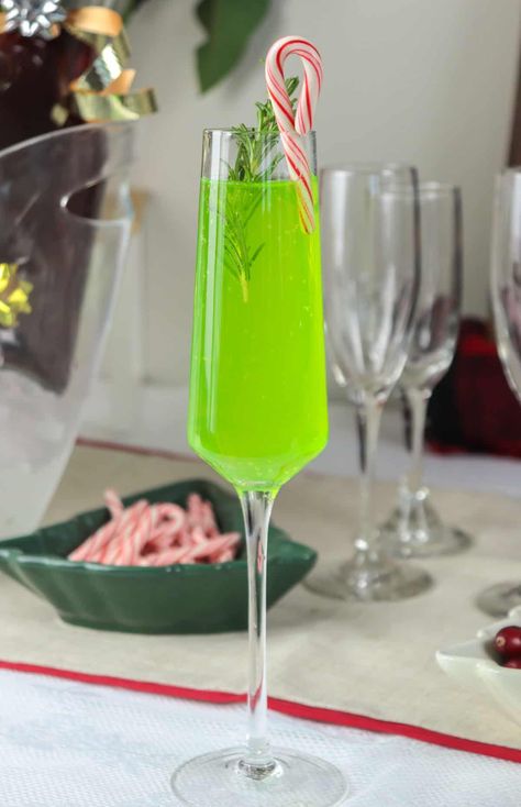 Elevate your holiday celebrations with a festive Green Grinch Mimosa! Sparkling with the colors of the season, this enchanting cocktail blends the crispness of champagne with the festive flavors of green apple and mint, making every sip a joyous toast to the holidays. Grinch Mimosa, Green Mimosa, Scooby Snack Shot, Holiday Mimosa, Christmas Breakfast Recipe, Melon Liqueur, Christmas Recipes Easy, Citrus Juice, Christmas Food Dinner