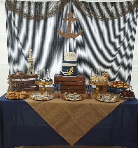 Nautical baby shower theme dessert table and backdrop. Anchor cake. Navy blue and burlap nautical theme. Nautical Baby Shower Cake, Nautical Baby Shower Boy, Decoration Communion, Sailor Baby Showers, Baby Shower Cake Table, Sailor Theme, Sailor Baby, Ahoy Its A Boy, Nautical Themed Party