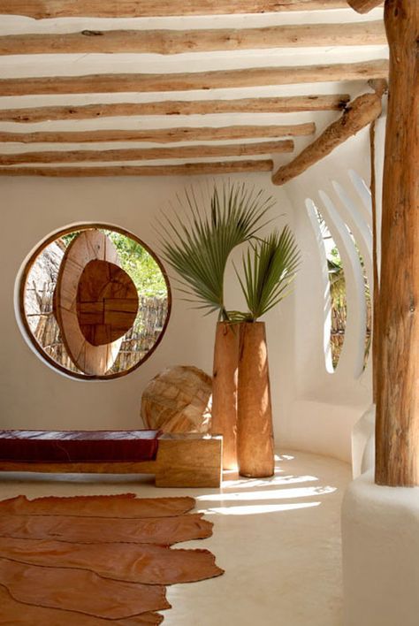 The magical safari house.... Superb ... The windo is amazing ... The wood blending into the concrete (?) is spectacular.... I want to live there !!! Safari House, Round Windows, Ui Ux 디자인, Straw Bale House, Earthship Home, African Interior, Natural Homes, Cob House, Earth Homes