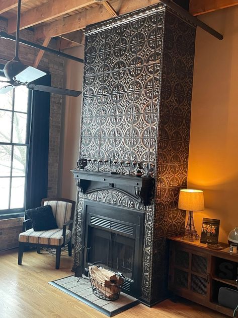 Fireplace Cover Tile, Ceiling Tile Fireplace, Tiled Wall Fireplace, Tin Tiles Fireplace, Fireplace Cover Up Tile, Home Fireplace Tile, Faux Tin Ceiling Wallpaper, Tin Wall Behind Wood Stove, Tin Ceiling Tiles On Wall