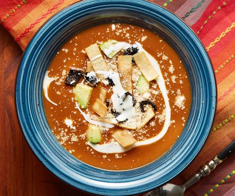 It's so cold out! Going to curl up with a bowl of this Tarascan Soup for a cozy Friday night. It has a creamy tomato, ancho chile, and pinto bean base with garnishes of flash-fried anchos and tortilla strips, avocado, and Mexican style cream and queso Cotija. Tarascan Soup, Pati's Mexican Table Recipes, Patti Jinich Recipes, Pinto Bean Soup, Patis Mexican Table, Pati Jinich, Pinto Bean, Tortilla Strips, Mexican Table