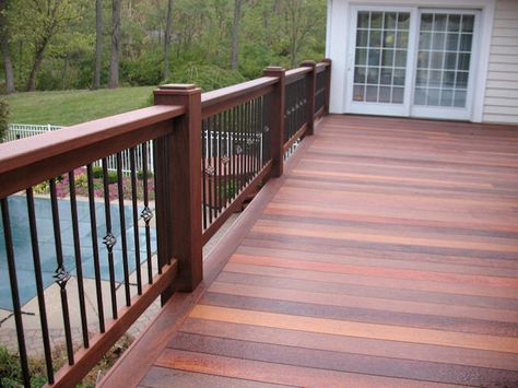 Like this wood color Multi Color Deck Stain Ideas, Deck Skirting Ideas, Stained Deck, Skirting Ideas, House Skirting, Wood Deck Railing, Deck Skirting, Metal Railing, Support Post