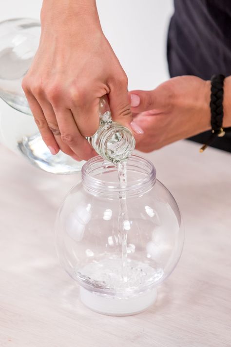 Make a homemade snow globe for the holidays Make Your Own Snow Globe, Making Snow Globes, Snow Globe For Kids, Make Your Own Snow, Christmas Snow Globes Diy, Homemade Snow Globes, Homemade Snow, Custom Snow Globe, Snow Globe Crafts