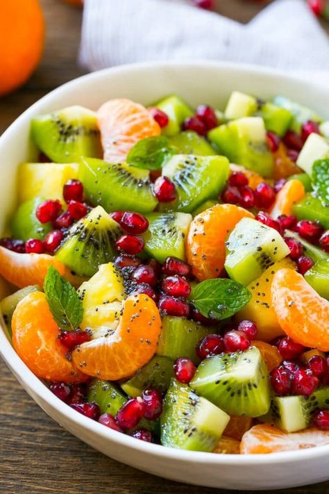 This winter fruit salad is a colorful variety of fresh fruit tossed in a light honey poppy seed dressing. Winter Fruit Salad, Resep Salad, Winter Fruit, Fruit Dishes, Fruit Salad Recipes, Idee Pasto Sano, Dinner Salads, Best Fruits, Diet Keto