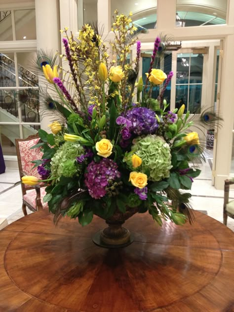 Mardi Gras Arrangement on display at IBERIABANK on St. Charles Avenue Mardi Gras Flower Centerpieces, Mardi Gras Floral Arrangements, Mardi Gras Flower Arrangements, Mardigrass Ideas, Mardi Gras Flowers, Mardi Gras Dinner Party, Mardi Gras Dinner, Mardi Gras Party Decorations, Madi Gras