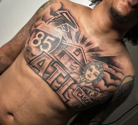 Hood Chest Tattoos, Back Bicep Tattoo, Inner Bicep Tattoo Men Ideas, Under Bicep Tattoo For Men, Bicep Tattoo For Guys Inner, Chest Piece Tattoos Mens, Chest Tattoo Men Ideas Black Man, Stomach Tattoos For Guys, Inner Bicep Tattoo Men