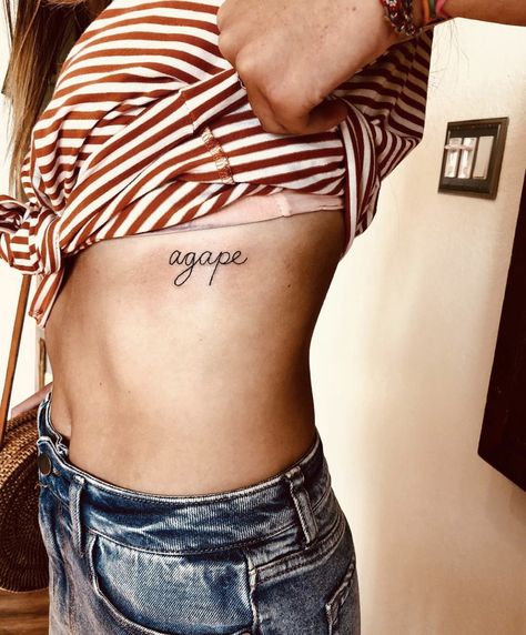 Agape Tattoo For Women, Rib Tattoo Breathe, Breathe Tattoos On Ribs, Agape Love Tattoo, Agape Tattoo Greek Fonts, Agape Tattoo, Rib Tattoos Words, Arm Quote Tattoos, Forearm Tattoo Quotes