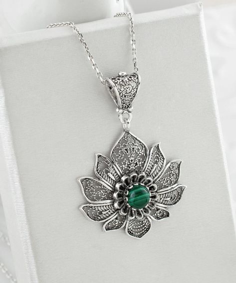 ✨ Unveil the elegance of rebirth with every wear! Our intricately crafted 925 Sterling Silver Filigree Art Malachite Gemstone Lily Flower Pendant is more than just a necklace; it's a symbol of renewal and beauty that complements your every moment. Handmade with love by FiligranUSA, it's the charm that transforms outfits and outlooks. 🌸 Ready to own a masterpiece of jewelry artistry? Click the link for a closer look or to make it yours! 💚 🔗 https://nuel.ink/ZRLpYB #SterlingSilverElegance #H... Blue Topaz Pendant Necklace, Quartz Pendant Necklace, Malachite Pendant, Amethyst Necklace Pendant, Women Pendant, Blue Topaz Pendant, Aqua Chalcedony, Flower Pendant Necklace, Sterling Silver Filigree