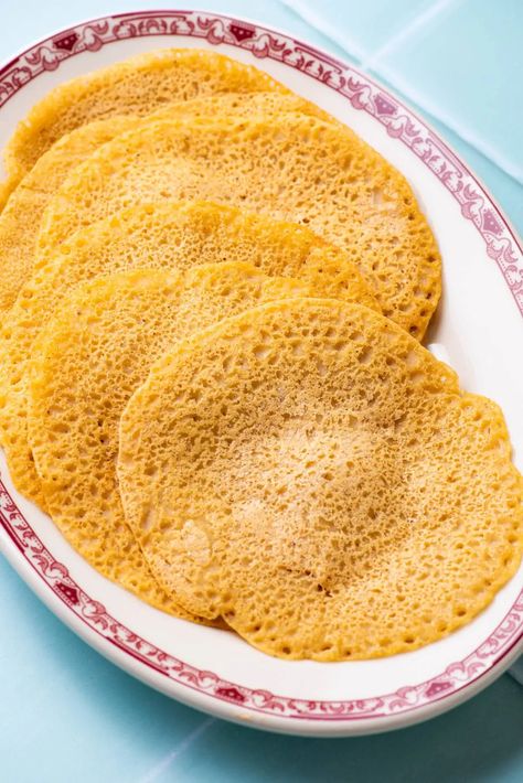 These 3-ingredient savory red lentil pancakes are inspired by Indian dosas. They’ve vegan, gluten-free, and high in protein, and can be served in any number of ways. thenewbaguette.com Red Lentil Pancakes, Lentil Pancakes, Lentil Bread, Vegan Lentil Recipes, Indian Lentils, Baguette Recipe, Savory Pancakes, Dosa Recipe, Summer Menu