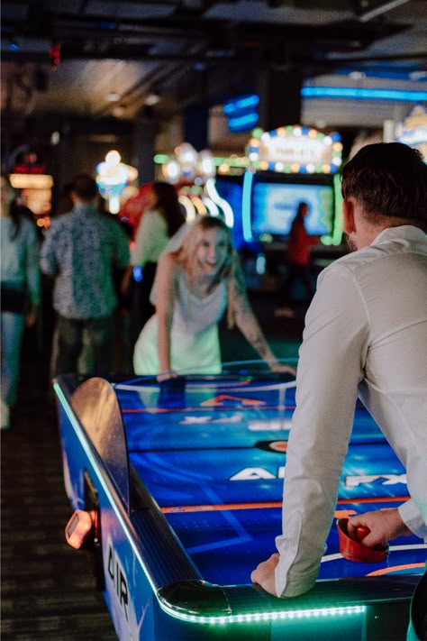 I had so much fun running around the arcade with these newlyweds! These San Diego fun wedding portraits are perfect Inso for outgoing couples. Get inspired by arcade couple photoshoot, arcade couple pictures, fun outgoing wedding photos, unique wedding photos, unique couple pictures, San Diego wedding photographer, Oceanside Ca photographer, Arcade engagement photos. Book Valerie as your photographer at https://valeriepenaphotography.mypixieset.com/contact/ Gaming Couple Photoshoot, Fun Pre Wedding Shoot Ideas, Arcade Prenup Shoot, Wedding Arcade Games, Arcade Photoshoot Outfit, Candy Shop Engagement Photos, Gamer Couple Photoshoot, Arcade Maternity Shoot, Roller Rink Engagement Photos