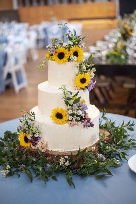 Sunflower Wedding Cake: Three Tier Cake with Small Wildflowers Purple Sunflower Wedding, Log Cake Stand, Flower Cake Design, Lavender Wedding Cake, Sunflower Wedding Cake, Sunflower Wedding Decorations, Sunflower Wedding Bouquet, Sunflower Themed Wedding, Wedding Cake Ideas