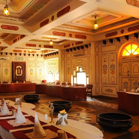 Attention foodies! Are you ready to embark on a culinary journey like no other? Give your taste buds a treat with mouthwatering Rajasthani meals alongside mesmerizing backdrops, adorned with stunning Rajasthani art. Book now and let your taste buds do the talking. Call +91-141-5165000 Rajasthani Art, Outdoor Barbeque, Bff Drawings, Indus Valley Civilization, Conference Hall, Rural India, Period Furniture, Luxury Dining, Green Landscape