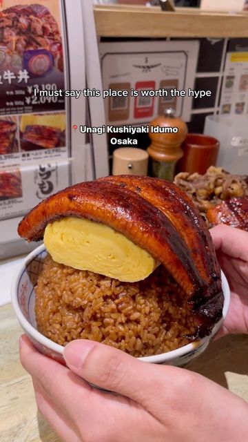 Hendri | the foodie 👨‍🍳 on Instagram: "🍚🥵Devouring this mighty 1 KG unagi don in Osaka! This place and its staff are so energetic and friendly! It’s insanely packed with unagi fans from around the world! Even though the line is long but it moves quickly! When you hear the staff hitting the drum, it’s a sign that new customers are being seated and a sign your turn is not far away! 😮‍💨 Def worth checking out if you are in Osaka! 📍Unagi Kushiyaki Idumo, Osaka Pro tip: find them at B2 (basement 2 floor) inside Lucua Shopping Mall, right next to Umeda station! #unagidon #ricebowl #sushiporn #eel #japanesefood #osakafood #osakatrip #japanlife #seafoodlovers" Unagi Don, Osaka Food, Japanese Travel, The Staff, I Want To Eat, Rice Bowls, A Sign, Japanese Food, Delicious Food