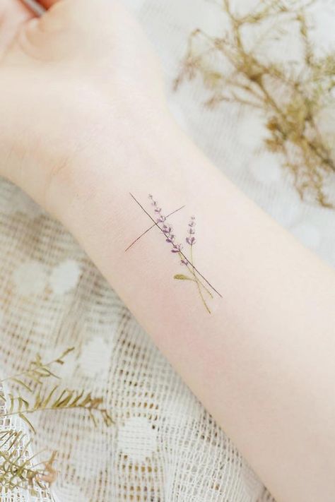 Powerful and Spiritual Cross Tattoo to Convey Your Life Message ★ Minimalist Wrist Tattoo with Cross and Flowers Minimalist Cross Tattoo Women, Minimalist Wrist Tattoo, Minimalist Cross Tattoo, Tattoo With Cross, Pretty Cross Tattoo, Faith Tattoo Designs, Cross Tattoo Design, Heart Flower Tattoo, Tiny Cross Tattoo