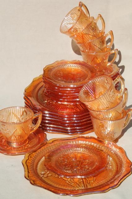 vintage marigold iridescent carnival glass dishes set iris & herringbone plates, cups & saucers Orange Carnival Glassware, Cool Dishes Set, Carnival Glass Display Ideas, Cute Dishes Sets, Glassware Display, Dishes Sets, Vintage Dishes Antiques, Carnival Glass Vintage, Carnival Glassware