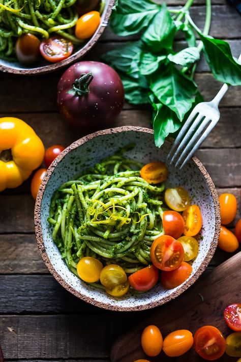 Bucatini Pasta with Arugula Pesto and Heirloom Tomatoes. A fast and flavorful weeknight dinner recipe. This Healthy pasta is Vegan! #bucatini #bucatinipasta #pastawithpesto #arugulapesto www.feastingathome.com Pasta With Arugula, Bucatini Recipes, Arugula Pasta, Almond Pesto, Bucatini Pasta, Arugula Pesto, Weeknight Dinner Recipe, Healthy Pastas, Healthy Dinners