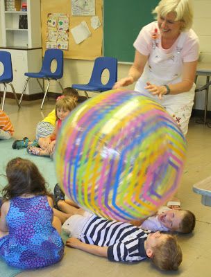 "Great Big Ball" Song & Activity - cute group activity to provide some proprioceptive input.  I would prefer children to be on their bellies though. Preschool Music, Gross Motor Activities, Creative Curriculum, Movement Activities, Preschool Songs, Music And Movement, Orff, Music Ideas, Teaching Children