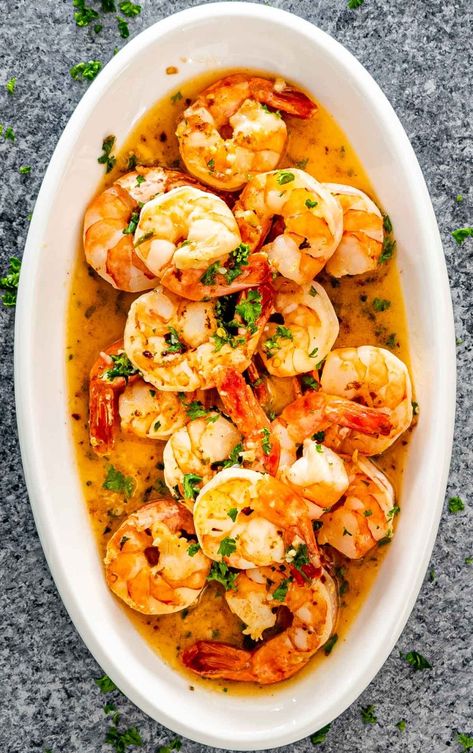 This succulent Garlic Butter Shrimp is perfect as an appetizer or as a full meal! It's also quick and easy to make and ready in 20 minutes. #shrimp #recipe #garlicbuttershrimp Jumbo Shrimp Recipes, Cooked Shrimp Recipes, Buttered Shrimp Recipe, Chicken Empanadas, Seafood Dish Recipes, Cooked Shrimp, Meat Meals, Crab Dishes, Jo Cooks