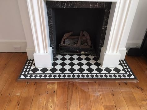 Checkered Fireplace, Checker Tile, Victorian Beach House, Fire Hearth, Tile Fireplace, Tile Showroom, Fireplace Hearth, Black And White Tiles, Home Fireplace