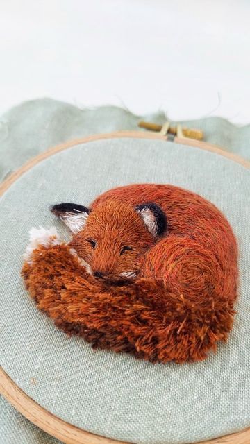 Megan Zaniewski on Instagram: "Zzz 🦊... Embroidering a sleeping fox from start to finish. I'm still thinking about what type of cozy sleeping place I'll create for him next. Maybe a mossy, leaf-strewn forest floor? 🍃🌿🌲 Edit: the finished piece is available in my Etsy shop (link in bio)" Fox Embroidery Simple, Megan Zaniewski, Craft Embroidery, Paper Fox, Rainy Day Crafts, Tally Ho, Fox Embroidery, Embroidery Beading, How To Wrap