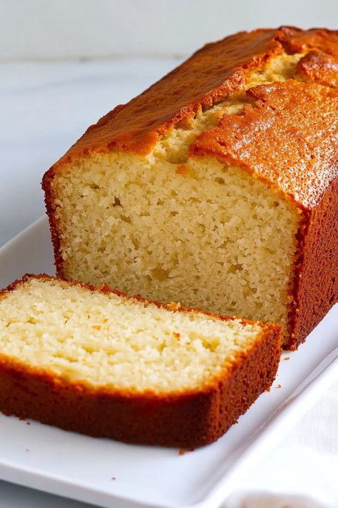 Looking for a wholesome treat? Try this delicious greek yogurt loaf recipe! Made with simple ingredients, this moist and flavorful loaf is perfect for breakfast or as a snack. The addition of greek yogurt gives it a lovely tangy flavor while keeping it nice and moist. Whether you enjoy it plain or topped with your favorite jam, this greek yogurt loaf is sure to become a new family favorite. Give it a try today and enjoy the goodness in every slice! Recipes To Use Up Plain Greek Yogurt, Greek Yogurt Loaf, Recipes Using Greek Yogurt, Recipes With Greek Yogurt, Cake With Greek Yogurt, Plain Yogurt Recipes, Plain Greek Yogurt Recipes, Greek Yogurt Recipes Healthy, Yogurt Recipes Healthy