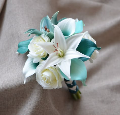 Thank you so much! Keep the confidence and we will tide over the difficulties together! ------------------------------------------------------------------------------ ------------------------------------- **This list is a wedding package including: - The cascade bridal bouquet, with real touch teal Picasso and teal calla lilies, ADD some turquoise calla lilies, ivory white roses, and teal lilies, white lilies. -USD118 - One toss bouquet, same flowers with the bridal bouquet, 6inch, USD32. - The Lilly Bouquet Wedding, Teal Wedding Bouquet, Aqua Wedding Colors, Teal Wedding Theme, Teal Bouquet, Turquoise Bouquet, Cascade Bridal Bouquet, Wedding Bridesmaid Flowers, Small Bridal Bouquets