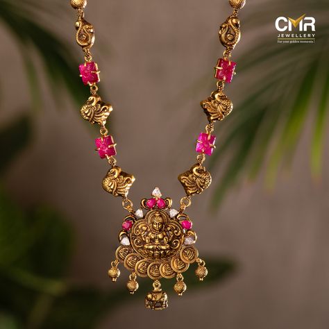 Rock that traditional glam and slay like a diva. Our temple jewellery haarams are adorned with Goddess Lakshmi motifs. Precious gems including rubies, pearls, and Signity Stones, elevate the grace of the jewellery. . . . #haram #neckpiece #haaramoftheday #emerald #haaramlovers #haaramaddict #haaramofinstagarm #ruby #emeralds #goldjewellery #southindianjewellery  #bridesofindia #southindianjewellery #indianjewellery #gold #cmrjewellery #cmrwomen Latest Gold Necklace Designs Indian Temple Jewellery, Redesign Old Gold Jewelry Indian, Latest Ruby Necklace Designs, Latest Gold Pendant Jewelry, Temple Jewellery Gold, Latest Gold Necklace Designs, Mini Haram, Lakshmi Haram, Traditional Glam