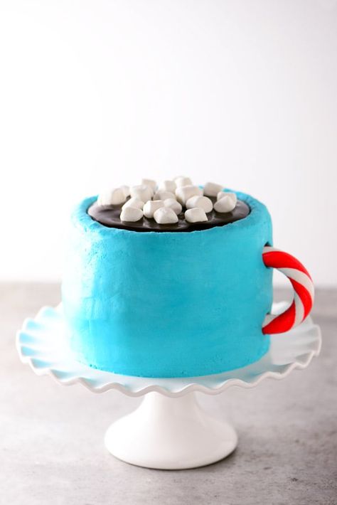 This Hot Cocoa Cake is the perfect thing to enjoy after a day of fun winter activities. With hot chocolate buttercream, chocolate ganache, and even mini marshmallows, this cake is sure to be a hit! Hot Cocoa Cake Recipe, Cocoa Cake Recipe, Hot Cocoa Cake, Unusual Cake, Creative Sweets, Hot Chocolate Cookies Cups, Gunny Sack, Cocoa Cake, Hot Chocolate Cookies