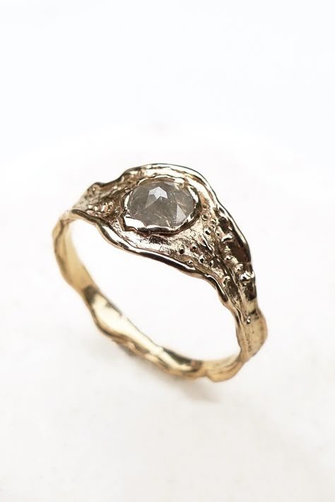 This ocean inspired engagement ring has a beautiful organic texture that mimics the textures and shapes from the sea.  From the way the tide flows on and off the sand, to the little seashells that dot the beach, and the sleek curves of kelp.  The ocean inspired engagement ring makes the perfect ring for an ocean lover or for someone who lives close to the coast. This engagement ring comes with a 5mm, rose cut, salt and pepper Diamond.  The Diamond will vary slightly from the pictures as each Dia Salt And Pepper Engagement Ring Oval, Engagement Rings Ocean, Nautical Engagement Ring, Engagement Rings Cool, Organic Shape Engagement Rings, Beach Engagement Ring, Silver Unique Engagement Rings, Chunky Engagement Rings Unique, Abstract Engagement Ring