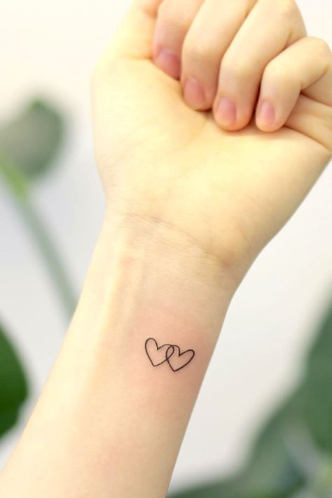 Hand Tattoos Heart, Small Heart Wrist Tattoo, Small Heart Tattoo Ideas, Small Tattoo Designs For Women, Small Heart Tattoo, Heart Tattoo Ideas, Simple Heart Tattoos, Small Phoenix Tattoos, Heart Tattoo Wrist