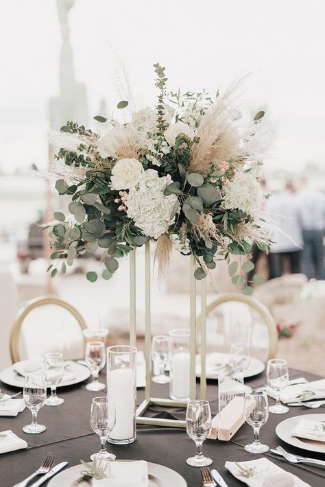 Jun 21, 2021 - A modern, tall centerpiece of eucalyptus, white blooms and pampas grass Lux Wedding, Tall Wedding Centerpieces, Tafel Decor, Grass Wedding, Wedding Floral Centerpieces, Tall Centerpieces, Wedding 2025, Eucalyptus Wedding, Wedding 2024