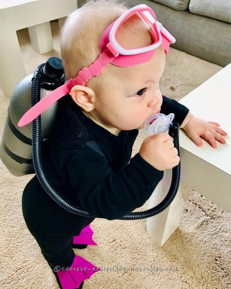 For nine month old Charley Paige, the BEST part of the day is bath-time! It’s no wonder, her Mom and Dad are both SCUBA divers, beach lovers, boaters and ocean seekers. Charley hasn’t been able to go to the beach, yet, (thanks Pandemic) so to cope, her absolute favorite thing to do is wade in ... Read more The post Cutest Lil’ Scuba Diver Costume for a Baby appeared first on Coolest Homemade Costumes. Diver Costume, Scuba Diver Costume, First Halloween Costumes, Small Dog Harness, Homemade Costume, Baby Pool, Pink Mask, Homemade Costumes, Halloween Costume Contest