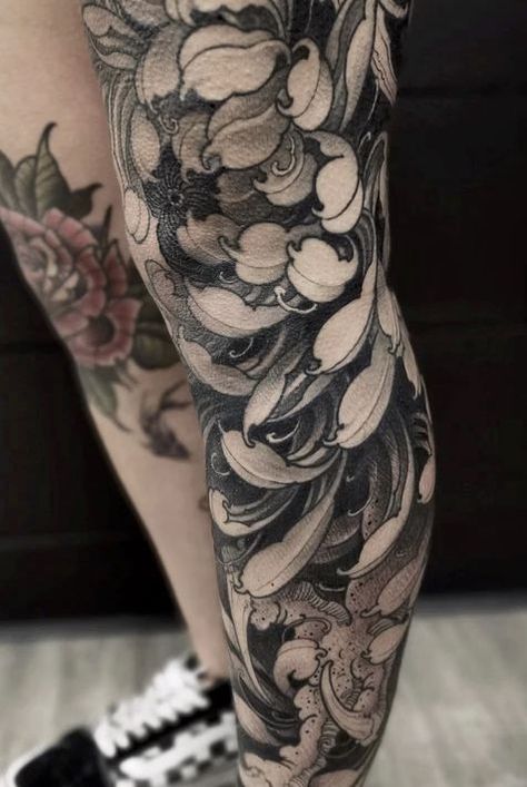 Discover the rich symbolism and Japanese history behind chrysanthemum tattoos. From delicate blooms to bold statements, find your perfect design here. Asian Flower Tattoo, Black Chrysanthemum Tattoo, Chrysanthemum Tattoos, Crisantemo Tattoo, Black Skull Tattoo, Japanese Flower Tattoo, Chrysanthemum Tattoo, Sak Yant Tattoo, Blackout Tattoo