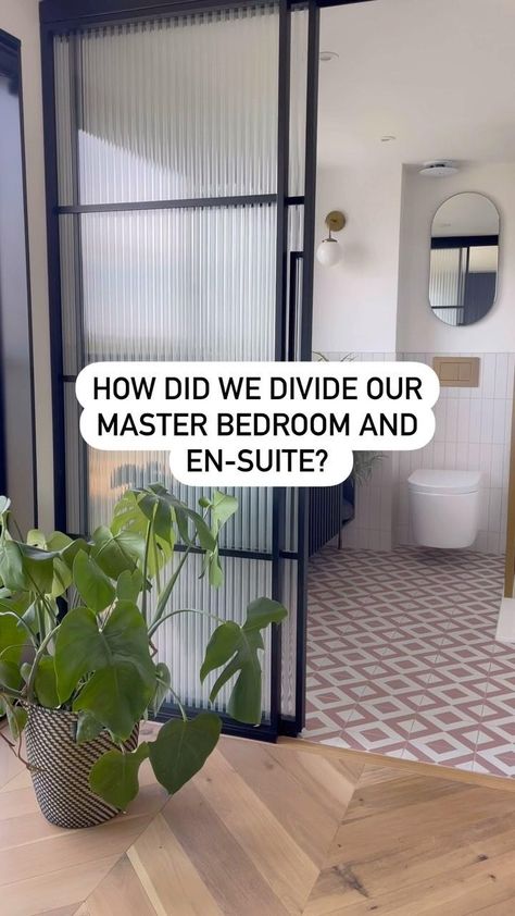 When I redesigned our loft conversion I wanted the bathroom to feel part of the bedroom, but still to feel like a separate room. I did consider the idea of an open plan bathroom at one point but I’m not sure I could have coped with that for various reasons…..going to the loo and the whole of Brockley possibly seeing us taking a shower. Instead of building a wall with a door in the middle, we decided to have a wall of crittal doors with reeded glass to fill the opening into the room, allowin... Open Concept Ensuite Bathroom, Crittal Doors Bathroom, Open Ensuite Bathroom, Bathroom Separator Ideas, Bathroom Glass Divider, Open En Suite Bathroom, Bedroom Bathroom Divider, Glass Wall For Bathroom, Double Door To Bathroom