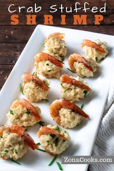 Crab Stuffed Shrimp are delicious, decadent and impressive. Large shrimp are butterflied and filled with a cream cheese, crab and chive filling, then baked. This dish makes a great appetizer for a small dinner party. It also works great as a lunch, dinner, or romantic date night meal recipe for two. Crabmeat Stuffed Shrimp, Pescetarian Snacks, Stuffed Shrimp Recipes, Stuffed Shrimp With Crabmeat, Stuffed Seafood, Crab And Shrimp Recipe, Small Dinner Party, Stuffed Shrimp, Shrimp Stuffed