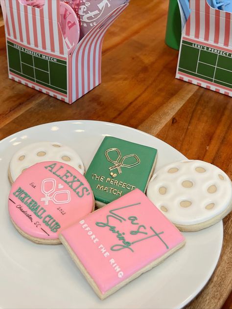 Pickleball party theme, pickle ball decorations, pickle ball bachelorette theme, wedding favors, bachelorette party ideas, unique bachelorette theme, pink green and white balloon arch, pickle ball, custom bachelorette cookies, pickle ball cookies, pink and Green Party decor, drinks and drinks, last swing before the ring, bachelorette party favors, koozies with grooms face on it, custom bachelorette t-shirts, bachelorette tumblers, bachelorette mimosa bar Wedding Pickleball Tournament, Pickleball Party Decorations, Pickleball Bachelorette Party, Pink And Green Bachelorette Party, Pickleball Bachelorette, Preppy Bachelorette Party, Golf Partee, Pink And Green Decor, Batchlorette Party