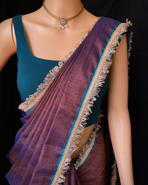 Copper blue tissue saree with contrast lace all over saree. Comes with beautiful teal blue thread tassels on pallu. Blouse: running blouse 80cm. To find this product in website: Www.thejacouture.in > Tissue sarees> copper blue tissue saree. Jewellery collaboration: @anvi__jewellery #mettalictissuesaree #tissuesaree #trendingsaree #tissuelacesaree #traditional #copperbluesaree #bluesaree Teal Saree With Contrast Blouse, Teal Blue Saree Contrast Blouse, Blue Tissue Saree, Net Saree Designs, Teal Blue Blouse, Tissue Sarees, Thread Tassels, Lace Saree, Saree Jewellery