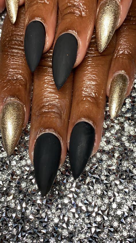 Purdue Nails, Black And Holographic Nails, Matte Black And Gold Nails, Black And Gold Stiletto Nails, Short Pointed Nails, Gold Sparkle Nails, Gold Stiletto Nails, Gold Manicure, Black Gold Nails