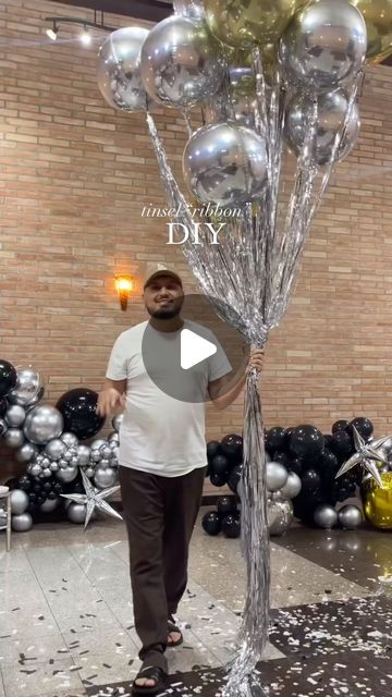 Function and Flowers on Instagram: "🪩 Keep watching to find out how to DIY the tinsel “ribbon” look.   @luisalejandrobeauty shares all you need to know to recreate this look!  These balloons can be the perfect addition to a disco themed party!  Follow for more function hacks, inspiration and more.  #eventplanner #weddingplanner #wedding #events #floraldesigner #partyplanner #eventplanning #party #florist #eventdecor #eventdesign #love #weddings #eventmanagement #birthdayparty #babyshower #weddingdecor #eventorganizer #weddinginspiration #decor #bride #balloons #corporateevents #weddingday #weddingplanning #photography #floralsdecor #decoration #eventstyling #weddingphotography" Diy Nye Ball Drop, New Year Backdrop Ideas Diy, Disco Theme Decor, Diy Disco Decor, Diy Prom Decorations, Diy Disco Party Decorations, Disco Decorations Party, Disco Wedding Decor, Disco Theme Parties Decorations