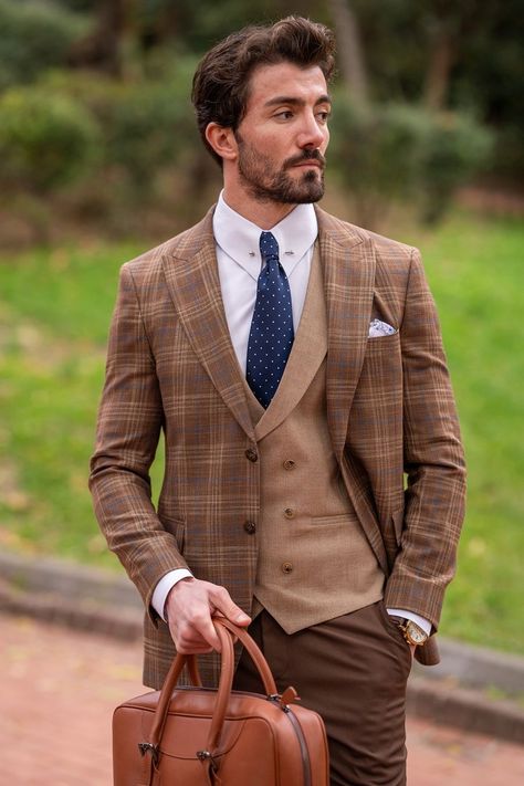 Step into plaid precision with the VIOSSI Brown Plaid Slim-Fit Suit 3-Piece. The mocha hues and slim-fit design create an ensemble that's both tailored and on-trend. Redefine your formal wardrobe with this stylish and distinctive suit. #suit #suits #plaidsuit #brownsuit  #VIOSSI #mensfashion #formalwear #sophisticatedstyle #tuxedostyle #suitlover Double Breasted Suit Wedding, Blazer Waistcoat, Bow Tie Suit, Modern Fit Suit, Suit Styles, Suit Stores, Slim Fit Suit Men, Plaid Material, Suits Wedding