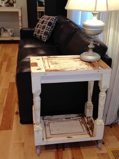 Fun and functional end table by Junk Chic 5280. Side table is made from salvaged vintage door and spindles.  Original chippy paint. Best part......on casters.  Coming to Vintage Whites Market in Denver, Colorado 2017. Side Table From Old Door, End Tables Repurposed, Sunroom Table, Wooden Kitchen Chairs, Diy Side Table, Diy End Tables, Vintage Side Table, Diy Furniture Renovation, Chippy Paint