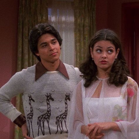 FASHION ICONS ✨ fez is the guy version of jackie which is why they work so well together ☺️ IF YOU REPOST ANY OF THESE, PLEASE GIVE CREDIT Fez And Jackie That 70s Show, Fez And Jackie, Jackie Burkhart Aesthetic, Fez That 70s Show, 70s Show Jackie, Jackie Burkhart Outfits, Ashton Kutcher Mila Kunis, The 70s Show, Jackie That 70s Show