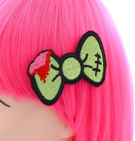 Introducing our ghastly yet stylish Zombie Bow Hair Clips, the perfect accessory for all horror enthusiasts and lovers of the undead! These hair clips will surely turn heads as you effortlessly blend spooky style with a touch of cute charm. Each bow is meticulously crafted with vibrant green embroidery, giving it a pop of color that beautifully complements any hairdo. One side of the bow features a frightfully delicious surprise - a bite mark, revealing a brain-like detail underneath. This uniqu Cute Gothic Accessories, Cool Accessories Aesthetic, Scene Hair Accessories, Cute Zombie Costume, Zombie Accessories, Horror Accessories, Scene Zombie, Aesthetic Handmade Gifts, Scenecore Clothes