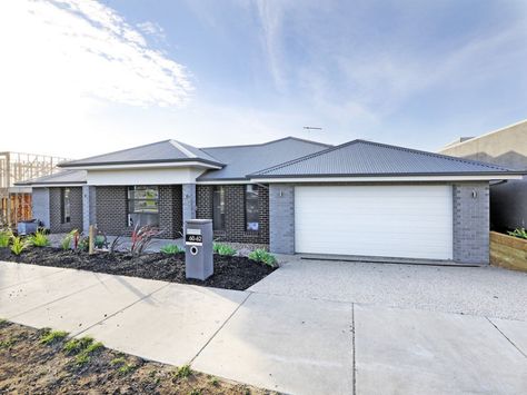 Basalt roof and gutters. Surfmist fascia, garage door and render. Monument windows. Colorbond Roof Colour Schemes, Shale Grey And Monument Exterior, Shale Grey Garage Door, Shale Grey Colorbond Roof, Shale Grey Roof Colour Schemes, Surfmist Garage Door, Basalt Colorbond Roof, Surfmist Roof Colour Schemes, Basalt Roof Colour Scheme