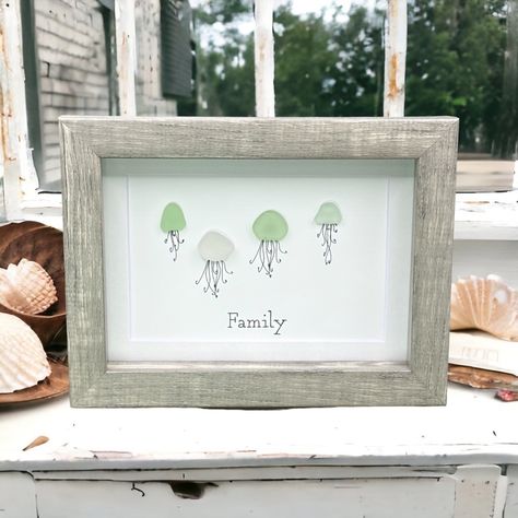 Sea Glass Art Family Present| Friendship Seaglass Jellyfish Framed Art Gift This Listing Includes: *Beautiful Sea Glass Art As Pictured *Genuine Sea Glass Used In Each Piece *Perfect Gift For A Birthday Or Holiday! *Original Minimalist Design Printed On Card Stock Paper With Sea Glass Attached * High Quality 5x7 Compostite Shadowbox Frame *Real Glass Front *Frame Available In Wood Grain, White Or Black *Bevel Cut Mat *Frame Depth Is 1.5 Inches And Stands Alone Or Can Be Hung *Note Included About Unique Jellyfish, Sea Glass Wedding, Sea Glass Artwork, Sea Glass Art Diy, Sea Glass Art Projects, Beach Glass Crafts, Present For Birthday, Jellyfish Art, Beach Glass Art