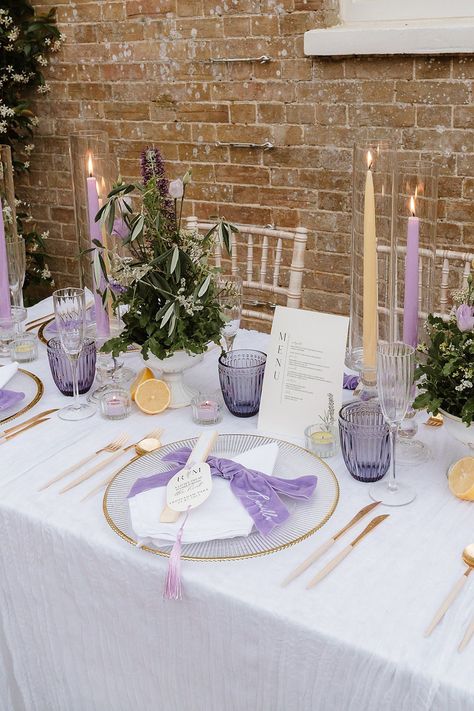 Table Decor Lilac Yellow Candles Flowers Shotesham Park Wedding By Emma Olivia Photography #wedding #weddingdecor Park Wedding Ideas, Purple Table Settings, Lilac Wedding Themes, Purple Wedding Tables, Light Purple Wedding, Purple Wedding Decorations, Dappled Sunlight, Candles Flowers, Candle Table Decorations