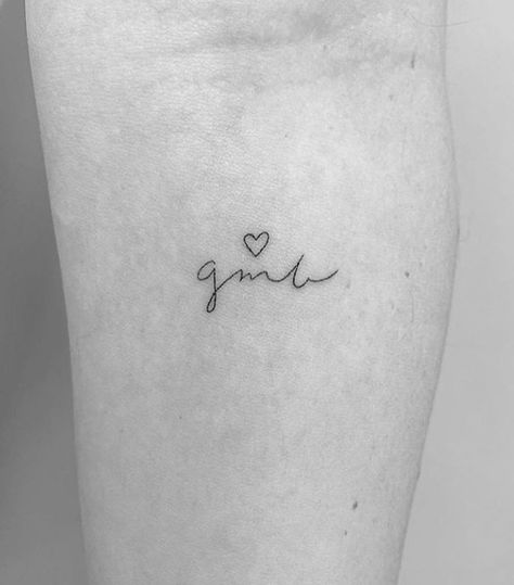 The 5 Most Stylish Tattoo Trends of 2020 | Who What Wear UK Childs Tattoo Ideas, Minimalist Tribute Tattoo, Childs Initials Tattoo, Tiny Tattoo For Son, Delicate Initial Tattoo, Minimalistic Name Tattoo, Fun Heart Tattoo, 3 Initials Tattoo, Dainty Tattoo For Kids