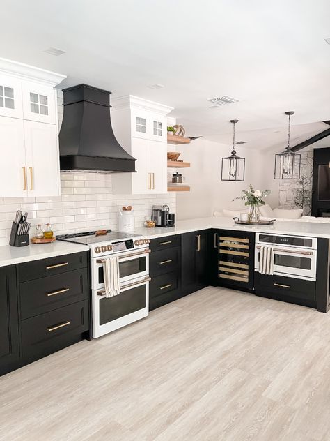 Kitchen Peninsula Attached To Wall, Black Beams, Kitchen Appliances Organization, Black And White Cabinets, Gold Kitchen Hardware, Trailer Makeover, Kitchen Peninsula, Motivational Podcasts, Cafe Kitchen