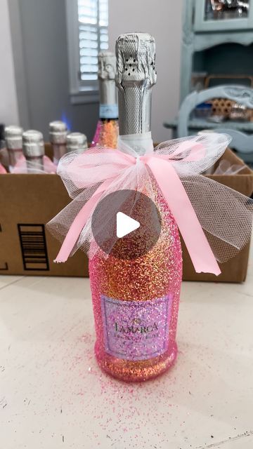 Amy Draper Darley on Instagram: "Sparkle up any celebration with glittery prosecco bottles! ✨🍾 This project turned out so cute & was EXTREMELY easy to do!! Perfect for birthdays or any occasion—just switch up the glitter! 

#DIYPartyIdeas #GlitterProsecco #ModPodgeMagic #DIYGiftIdeas #DIY #DIYGift #Wine #WineBottleGift #EasyGiftIdea #GiftIdea #GiftsForHer #PartyDecor #DIYPartDecor 

Comment SHOP below to receive a DM with the link to shop this post on my LTK ⬇ https://liketk.it/4QcAh #ltkparties #ltkvideo" How To Seal Glitter On Wine Glasses, How To Decorate Wine Bottles As Gifts, Diy Wine Bottle Painting, Prosecco Bottle Decoration, Glitter Bottle Diy Alcohol, Glitter Champagne Bottle Diy, Decorating Wine Bottles, Glitter Bottle Diy, Wine Exchange